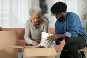 A senior with dementia packs up her home with her son as she downsizes.