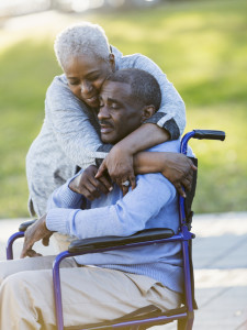 Hugging a loved on in a wheelchair