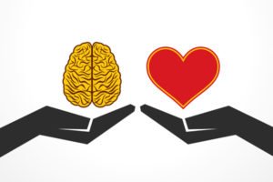 hands holding brain and heart