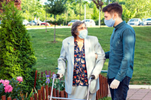 caregiver helping senior get some fresh air